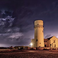 Buy canvas prints of Lightning over the old lighthouse  by Gary Pearson