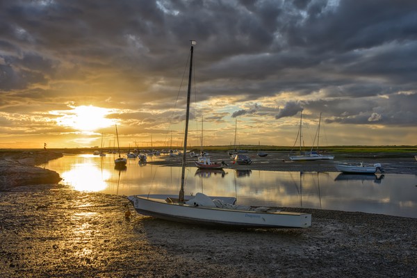 Sunset over Brancaster Staithe Picture Board by Gary Pearson