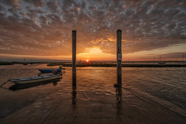 Brancaster Staithe at sunset Picture Board by Gary Pearson