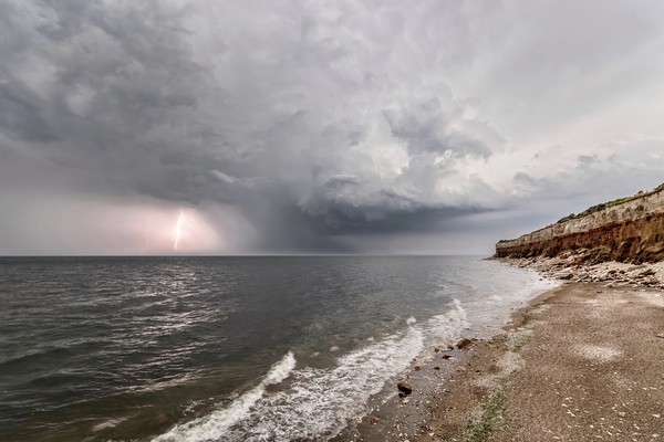 A storm at sea & the striped cliffs at Hunstanton Picture Board by Gary Pearson