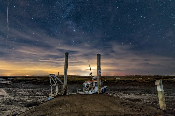 Moored under the stars at Brancaster Staithe  Picture Board by Gary Pearson