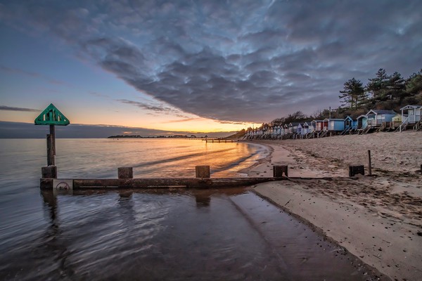 Sunrise over beautiful Wells-next-the-Sea beach in Picture Board by Gary Pearson