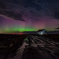 Buy canvas prints of Northern lights over the old coal barn at Thornham by Gary Pearson