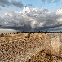 Buy canvas prints of A cloudburst over Titchwell and Brancaster by Gary Pearson