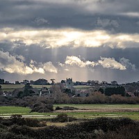 Buy canvas prints of God rays over St Mary’s church Holme-next-the-Sea  by Gary Pearson