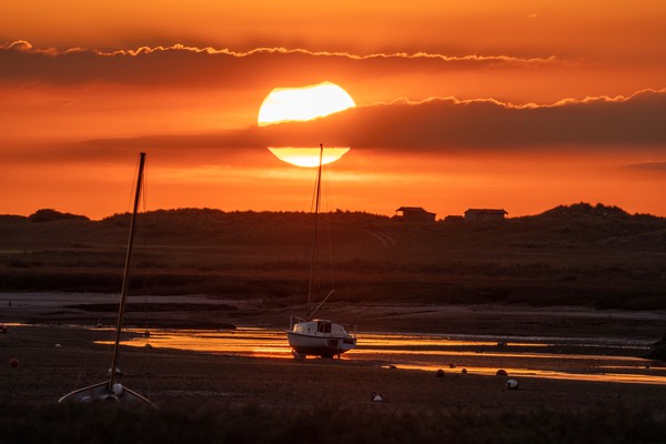 Sunset at Brancaster Staithe  Picture Board by Gary Pearson