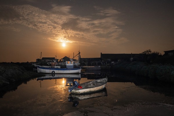 Moonrise before midnight - Brancaster Staithe  Picture Board by Gary Pearson