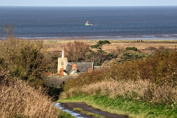 Looking out to sea over St Mary’s Church Picture Board by Gary Pearson