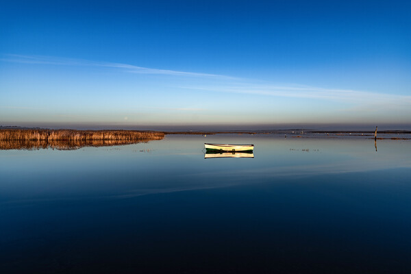 Early morning reflections at Brancaster Staithe  Picture Board by Gary Pearson