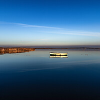 Buy canvas prints of Early morning reflections at Brancaster Staithe  by Gary Pearson