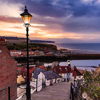 Buy canvas prints of Whitby By Lamplight by Trevor Camp