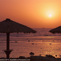 Buy canvas prints of Sunrise with beach parasols, Dahab, Egypt by stefano baldini