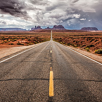 Buy canvas prints of The long straight road to Monument Valley, Utah by Steven Clements LNPS