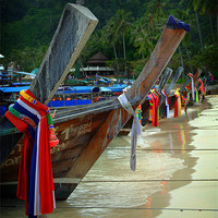 Buy canvas prints of Thailand boats at waters edge. by David Worthington