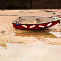 Buy canvas prints of Dinghy on the beach at St Ives, Cornwall by Louise Heusinkveld