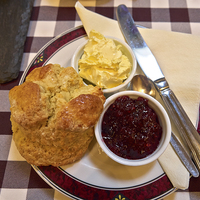 Buy canvas prints of Cream tea with home made scone, jam, and clotted c by Louise Heusinkveld