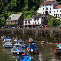 Buy canvas prints of Lynmouth Harbour in early morning at low tide, Dev by Louise Heusinkveld