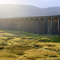 Buy canvas prints of Ribblehead Viaduct in autumn sunlight, North Yorks by Louise Heusinkveld