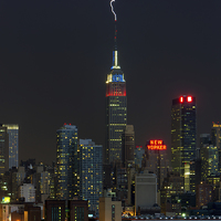Buy canvas prints of Empire State Building Lightning Strike I by Clarence Holmes