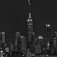 Buy canvas prints of Empire State Building Lightning Strike II by Clarence Holmes