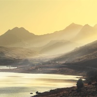 Buy canvas prints of Sun rays over Snowdon by Robert Fielding