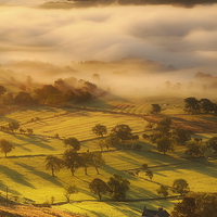 Buy canvas prints of Golden mists over castleton 2 by Robert Fielding