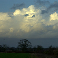Buy canvas prints of Clouds in the sky by John Boekee
