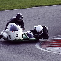 Buy canvas prints of Racing sidecar at Snetterton racetrack  by John Boekee