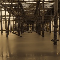 Buy canvas prints of Derelict Hastings Pier by Angie Morton