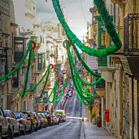 Buy canvas prints of Valletta Street Festival time Malta by Diana Mower