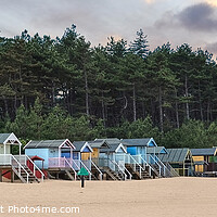 Buy canvas prints of Wells beach Huts sunset panoramic by Diana Mower
