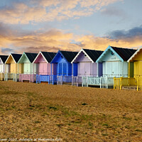 Buy canvas prints of West Mersea Beach Huts Sunset  by Diana Mower