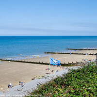 Buy canvas prints of Sheringham Blue Flag Beach by Diana Mower