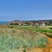 Buy canvas prints of Sheringham town and Golf Course by Diana Mower