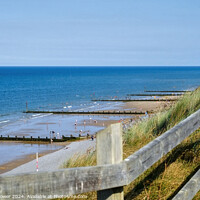 Buy canvas prints of Sheringham above the Beach   by Diana Mower