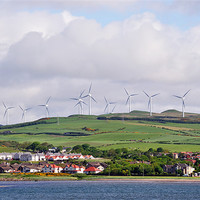 Buy canvas prints of Ardrossan town and windfarm Scotland by Diana Mower