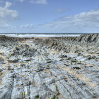 Buy canvas prints of Woolacombe beach Rocks Devon by Diana Mower