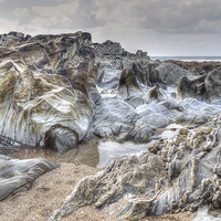 Buy canvas prints of Woolacombe beach Rocks by Diana Mower