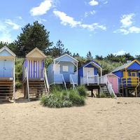 Buy canvas prints of Beach Huts by Diana Mower