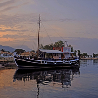 Buy canvas prints of  Messonghi River Boat by Diana Mower