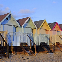 Buy canvas prints of  Mersea Beach Huts by Diana Mower