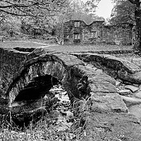 Buy canvas prints of Wycoller Packhorse Bridge by Diana Mower