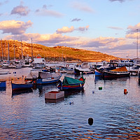 Buy canvas prints of Gozo Harbour at Sunset Malta by Diana Mower