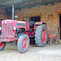 Buy canvas prints of Tractor at the barn by Arfabita  