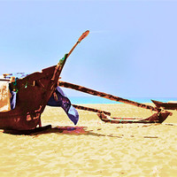 Buy canvas prints of Catamarans beached in Tropics by Arfabita  
