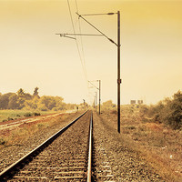 Buy canvas prints of Indian Hinterland landscape with railroad track by Arfabita  