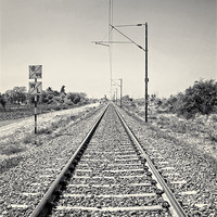 Buy canvas prints of Railroad track through India heading to Surat by Arfabita  
