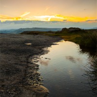 Buy canvas prints of Puddle on Curbar Edge by Jonathan Swetnam