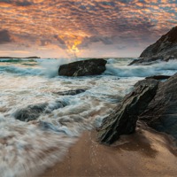 Buy canvas prints of Lusty Glaze Cove at Sunset by Jonathan Swetnam