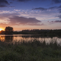 Buy canvas prints of Horbury Lagoon Sunset by Dave Evans